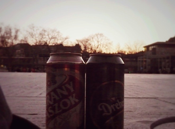 The beer. (It is allowed to drink in public)