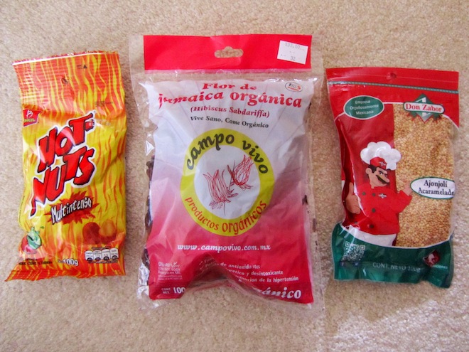 Left to right: hot nuts, hibiscus flower, candied sesame seeds.