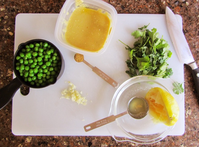 Peas, tahini, cilantro, garlic, lemon, and cumin. 